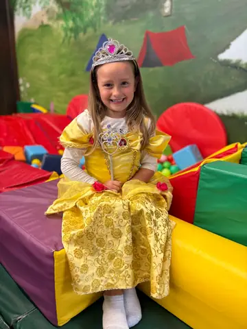 A princess gown and a soft play throne