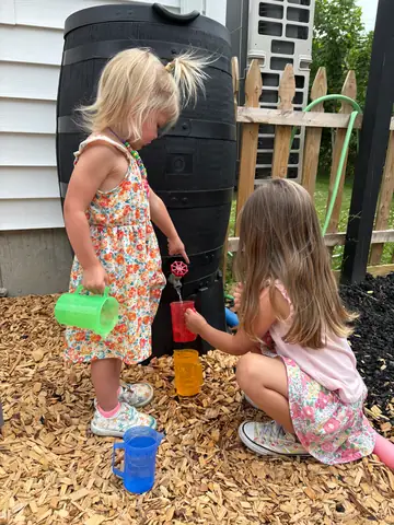 Watering cans in the yard
